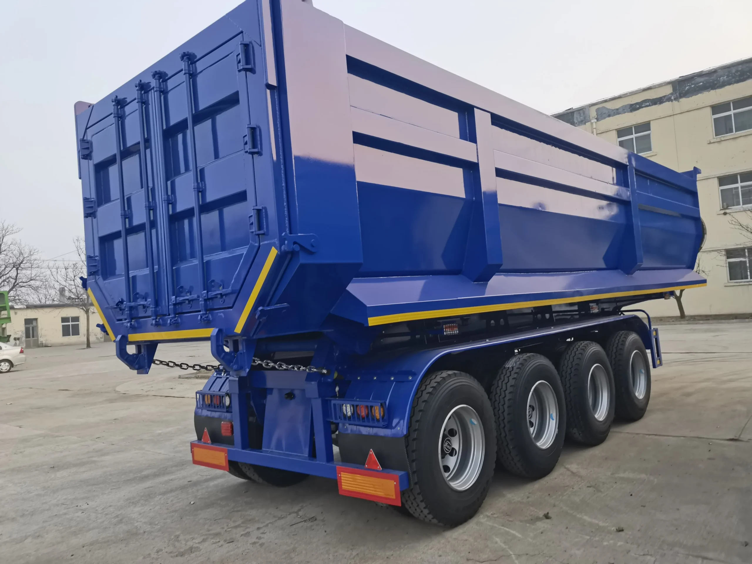 High-sided rear-tipping body of the 4 axle dump semi trailer